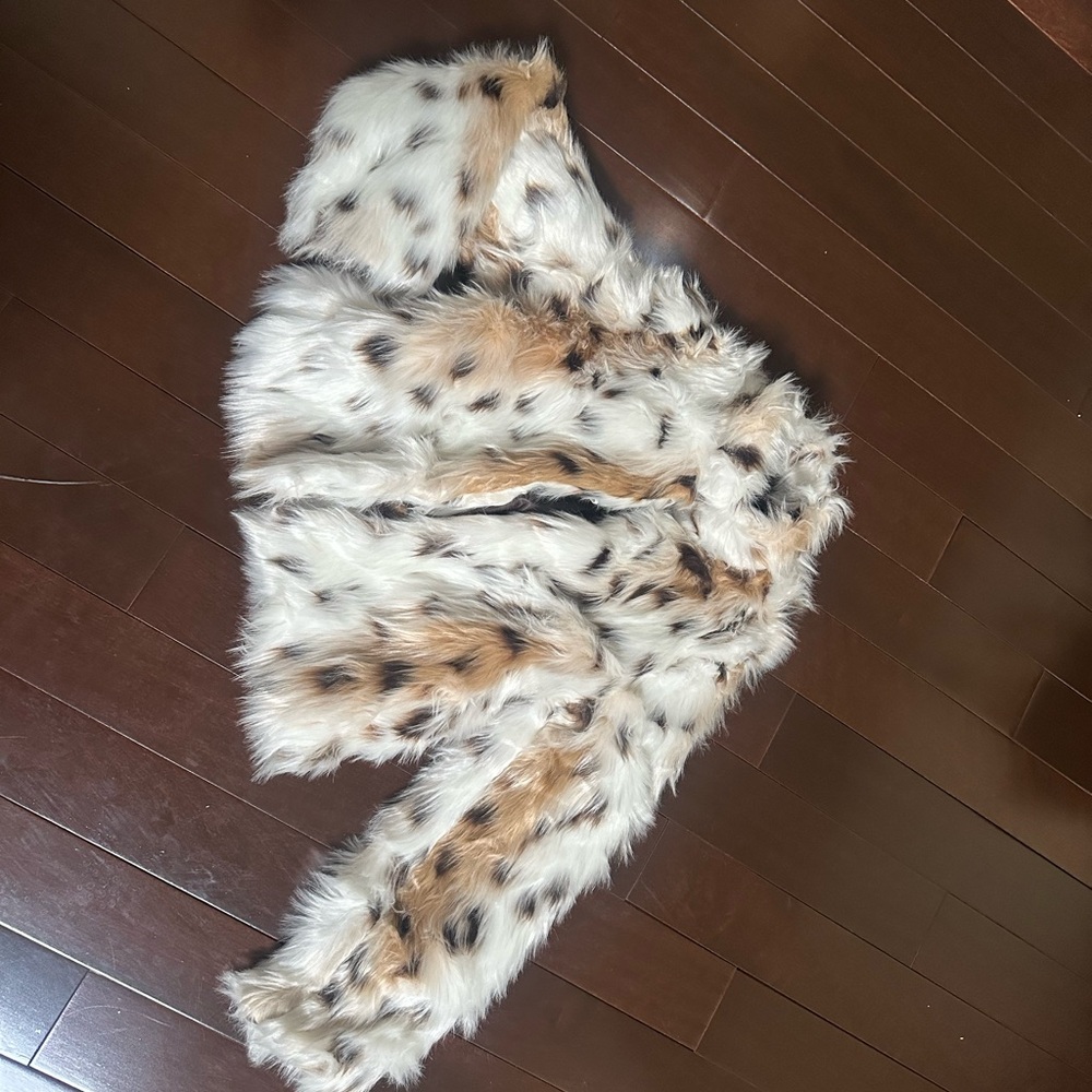 White and Brown Fur Jacket with Exotic Animal Print and Plush Texture
